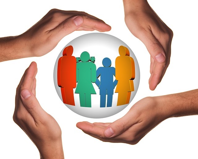 Hands protecting crystal ball